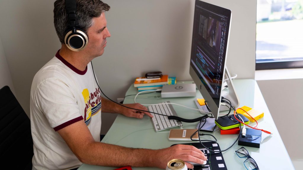 Parachute Media’s Creative Director building editing a video to support an ads campaign.