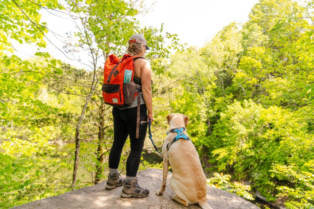 woman and dog hiking